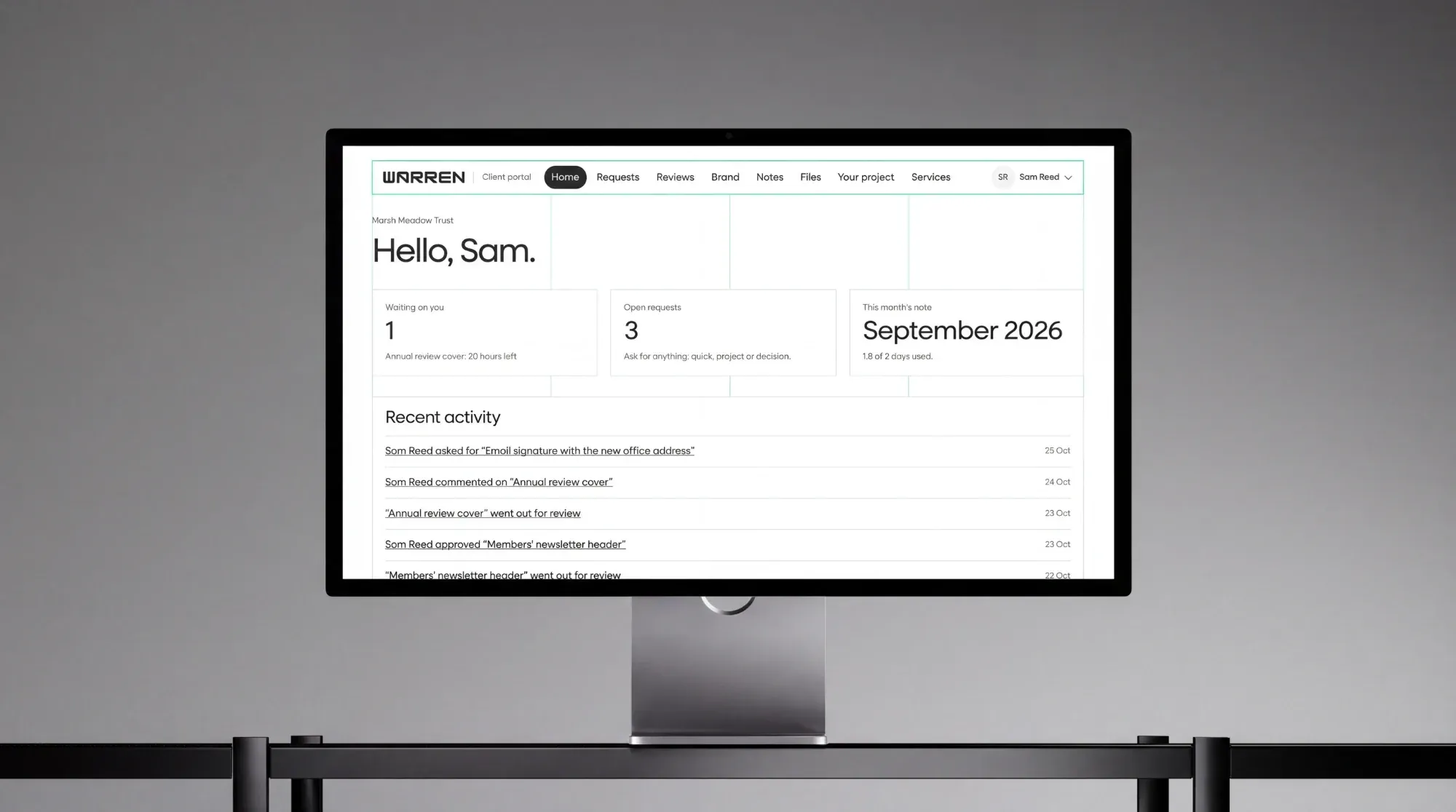 The client portal on a desktop monitor: Home for Marsh Meadow Trust, a demo client, with one decision waiting and 20 hours left, three open requests, September's note with 1.8 of 2 days used, and recent activity.